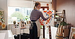 Woman, painting and art on canvas at house with abstract design, color pattern and creative. Female artist, easel and artwork process for craft project, expression freedom and unique piece in studio