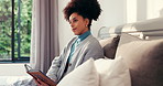 Reading, relax and thinking with woman in bedroom of home for break, literature hobby or wellness. Book, imagine and novel with African person on bed in apartment for fantasy or fiction storytelling