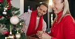 Christmas tree, decoration and smile with couple in living room of home together for festive celebration. Cheer, happy and holidays with people in apartment for December season or winter tradition