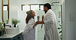 Dancing, couple and karaoke in bathroom, play and sing with brush in home, silly or morning routine. Happy, man and bonding with woman in house, romance and people with rhythm, smile or getting ready