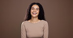Skincare, woman and face in studio for dermatology, brown background and confident smile. Mockup space, happy and female model with beauty glow, laugh and self care with natural facial cosmetics