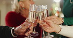 Champagne, cheers and family in home for christmas celebration, party or gathering together. Happy, toast and people in dining room with sparkling wine for xmas event in festive season at house.