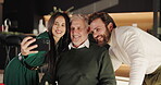 Family, selfie and smile of couple with old man in home at night for memories or photograph. App, profile picture or social media with husband, wife and senior parent in apartment for evening visit