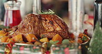 Chicken, feast or dining table with meal for thanksgiving dinner, cuisine or hospitality in home. Closeup, food and roast with vegetables or gourmet dish for christmas celebration or hosting in house