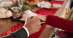 Christmas, dinner and family holding hands in prayer at table for faith, gratitude or blessing food. Christianity, lunch and people in home with grace for thanksgiving supper, worship God or thankful