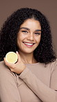 Beauty, lemon and face of woman in studio for natural, health and facial glow with hydration. Organic, skincare and portrait of female person with citrus fruit for brightening by brown background.