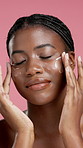 Cream, apply and face of black woman for beauty, facial cosmetics and anti aging on studio background. Dermatology, portrait and African person with lotion for moisturizer, hydration and skincare