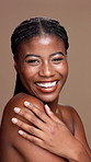 Black woman, face and touch shoulder for beauty in studio, dermatology or smooth texture on brown background. Treatment, shine and skincare portrait with female person, skin health and self care