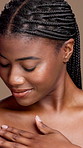 Touch, skincare and face of happy black woman for cosmetics, beauty and body care. Dermatology, aesthetic and portrait of African person for grooming, skin glow and hydration on studio background