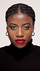 Face, makeup and confident black woman with lipstick, glow and aesthetic in studio. Portrait, serious and African model with cosmetics, red lips and shine for beauty with eyeliner on white background