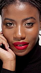 Face, makeup and black woman with lipstick in studio, glow and beauty on white background. Portrait, confidence and African model with cosmetics, red lips and shine for aesthetic with eyeliner 