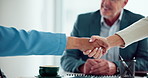 Office, business people and shaking hands in meeting for agreement, contract or financial funding. Group, handshake and mature manager with partnership, investment or collaboration for corporate deal