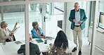 Presentation, planning and proposal with business man in office for growth strategy, shareholder and pitch. Investment meeting, discussion and above of people in boardroom for speaker and screen