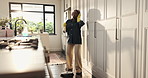 Broom, headphones and black woman in home for cleaning, floor maintenance and hygiene in living room. Happy, apartment and person listen to music for housekeeping, dust prevention and sweeping