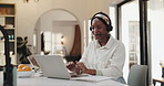 Headset, remote work and black woman on laptop talking for online help, virtual assistance or advice. Working from home, consultant and person on computer for customer service, support and contact us