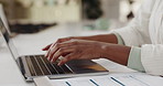 Person, hands and typing with laptop in home for research, financial planning or expenses. Closeup, freelancer or remote work with documents on computer for online finance, invoices or bills in house