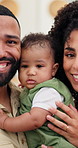 Happy family, face and hug with baby for love, bonding or childhood development in home. Portrait, dad and mom with toddler or embrace together for parenthood, holiday or security and safety in house