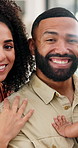 Happy family, face and love with baby for bonding or childhood development together in home. Portrait, dad and mom with hug, toddler or embrace for parenthood, holiday or security and safety in house