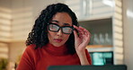 Confused, glasses and laptop with woman in kitchen of home for reading, remote work or research. Computer, doubt and eyewear with freelance employee in apartment for planning or problem solving