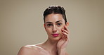 Cosmetics, face and skincare with woman on studio background for dermatology results or wellness. Beauty, facial and makeup with confident model on space for aesthetic cosmetology or satisfaction