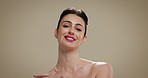 Face, woman and confident for skincare in studio background of healthy skin, texture and hydration. Female person, beauty and satisfaction for facial glow, treatment wellness and dermatology benefits
