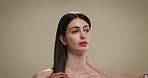 Woman, beauty or haircare with salon treatment for volume or hair styling on a studio background. Female person, makeup and hands with hairdresser for keratin, brazilian shine or glow on mockup space