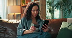 Home, credit card and woman on sofa, smartphone and banking with transaction. Online shopping, ecommerce and person with savings, cellphone and investment with consumer, fintech and discount deal
