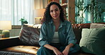 Face, happy and woman in lounge, confident or comfortable on couch in house, smile or relax on break. Resting, person and chilling on sofa in home, calm and pride on weekend, apartment or Canada