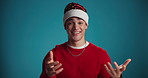 Christmas, man and phone with credit card in studio for online shopping, festive gift and fast service. Face, person and snap fingers with app for xmas present and quick delivery on blue background