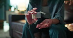 Pills, health and hands of woman on sofa for medical prescription, supplements and drugs. Medicine, wellness and bacteria antibiotics with person in living room of home for medication and vitamins