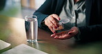 Pills, water and hands of woman in clinic with medicine, prescription and medication for recovery. Healthcare, glass and person with container for vitamins, supplements and drugs for medical symptoms