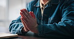 Closeup, hands together and man with religion, prayer and begging with hope, bible and blessing. Christian, person and believer with faith, holy scripture and asking for help, assistance and guidance