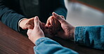 Empathy, holding hands and support with people in home together for grief counseling, loss or pain. Love, solidarity and trust with friends in apartment for bonding, confession or forgiveness