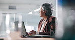 Thinking, mature or businesswoman on laptop with ideas, solution or investment banking career. Finance, problem solving or professional banker typing with technology,  experience and financial report
