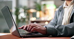 Hands, laptop and typing with business person at desk in office for feedback, report or review. Computer, keyboard and planning with employee in workplace for agenda, online calendar or schedule