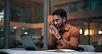 Laptop, night and phone call with business man in office for planning, research deadline or schedule. Agenda, communication and computer with employee person at work in evening for report or update
