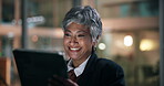Laughing, night and tablet with business woman in office for planning, schedule or review. App, funny and meme with mature employee in workplace for evening agenda, project management or research