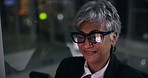 Night, business and woman with phone, glasses or internet with social media, email or app. Evening, mature person or employee in office, tech or financial agency with reflection or message to contact