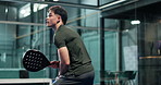 Racket, sports and man on padel court for practice, activity or fitness with exercise. Competition, training and male athlete with indoor cardio workout, hobby or tournament with skills for action.