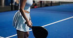 Hands, woman and serve with racket for padel games, sports training and practice for competition. Athlete, person and ready with ball for contest performance, match preparation and fitness tournament