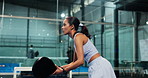 Sports, woman and playing padel on court for match practice, game training and serving ball. Fitness, tennis player and ready with racket at indoor club for technique exercise, performance and energy