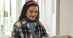 Laptop, reading and smile with business woman at desk in office for creative planning or strategy. Computer, research and web development with happy designer in workplace for agenda or schedule