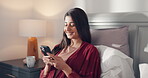 Smile, phone and reading with woman in bedroom for social media, text message update and relax. Online news notification, morning and network with person in home for communication app and chat