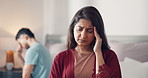 Frustrated couple, headache or stress with argument in bed for disagreement, fight or conflict. Upset, man and woman with toxic relationship or breakup for cheating affair, dispute or divorce in home