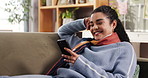Happy, phone and woman on sofa for social media, online networking and connection in home. Weekend, relax and person on smartphone laugh for funny text, typing message and internet in living room