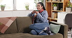 Thinking, drinking coffee or happy woman on couch to relax in home for cup of hot chocolate. Cappuccino, smile or person enjoying warm beverage on sofa for cozy break, latte or caffeine in winter