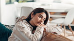 Serious, woman and relax with thinking in home for planning future, reflection and nostalgic memory. Peaceful, person and thoughtful in living room with perspective, wondering and decision on sofa