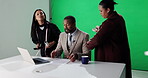 News anchor, makeup and production with man on green screen for broadcast touch up, presenter and help. Journalist reporter, stylist team and talk show host with person in studio for cosmetics
