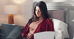 Reading, laptop and documents with woman in bed of home for remote work, blog report and seo research. Freelancer, article performance and update with person in bedroom of apartment for post