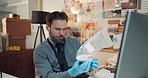Man, officer and private investigation with evidence for crime scene or murder case in office. Male person, investigator and gloves with DNA sample for police research, lead or suspect in workplace